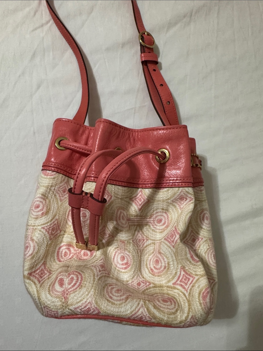 Coach Coral Pink Patterned Drawstring Crossbody Bag